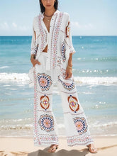 Pantalones anchos y holgados con estampado floral de satén moderno y exquisito